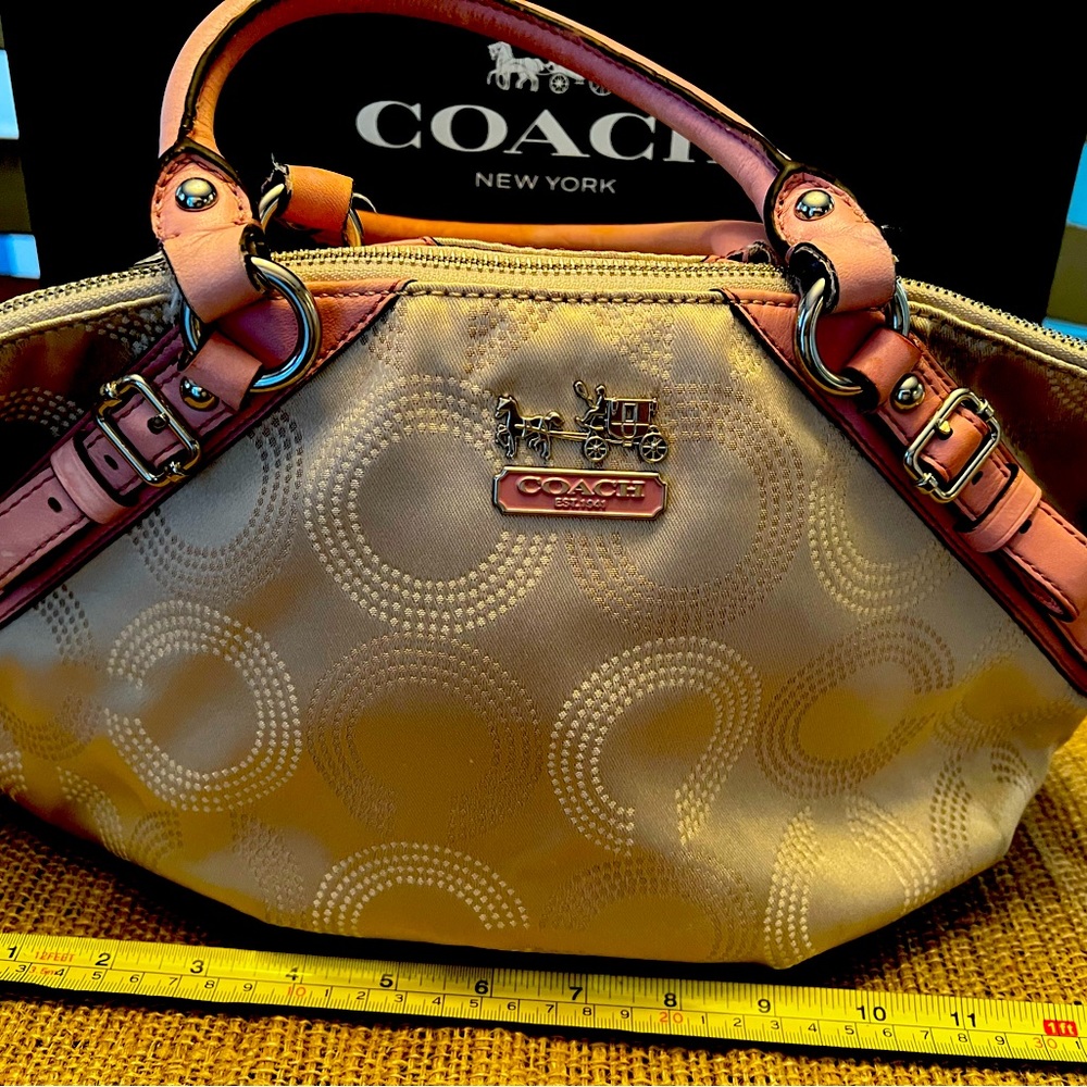 Coach tote on pink and cream